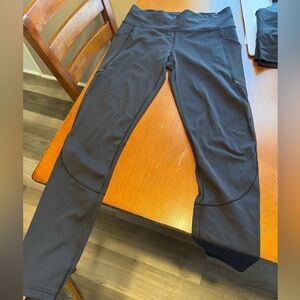 Lulu lemon leggings. Black. Mesh on both legs shown in picture. Size 4